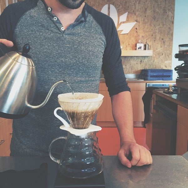 Photo taken at Beansmith Coffee Roasters by Ben R. on 7/15/2014