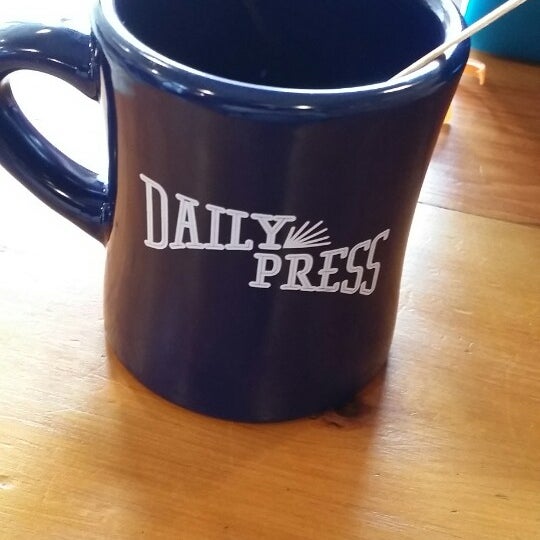 Photo taken at Daily Press Coffee by Stella T. on 4/23/2014