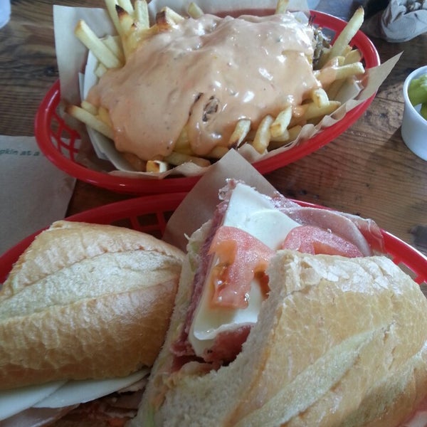 Photo taken at Capicola&#39;s Gourmet Sandwich Co. by Marc S. on 5/14/2015