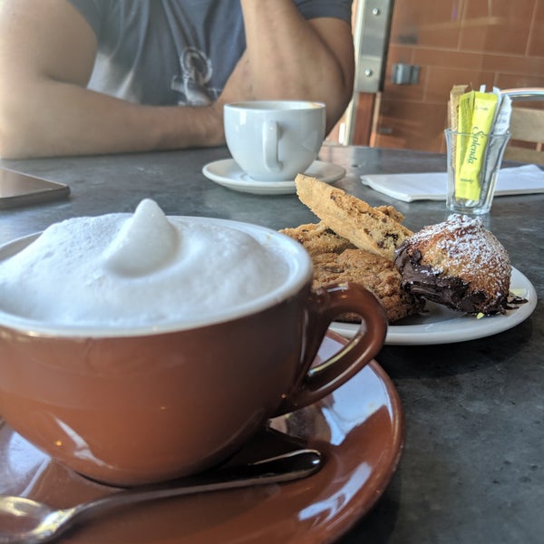 Photo taken at Oliveto Cafe &amp; Restaurant by Amanda I. on 8/3/2019