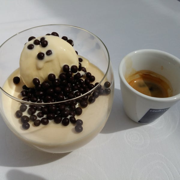 Dessert white chocolate mousse with baileys and poured with espresso