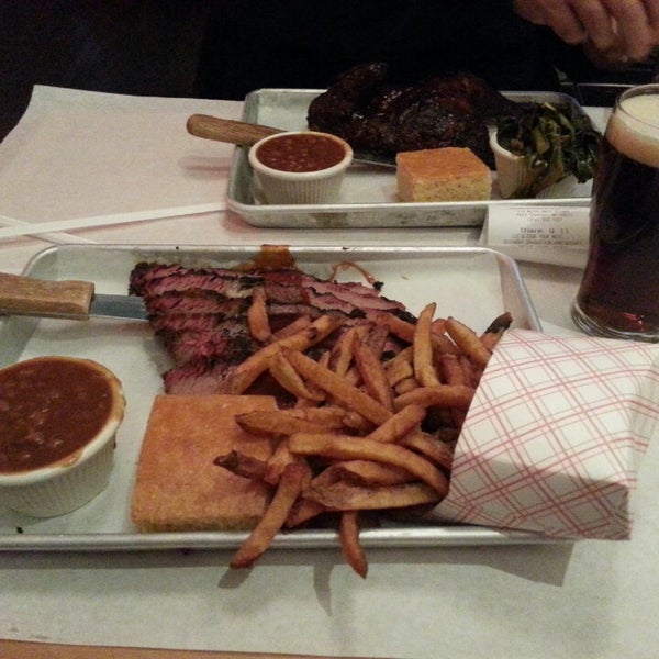 Photo taken at Q Restaurant &amp; Bar by Jon G. on 3/1/2014