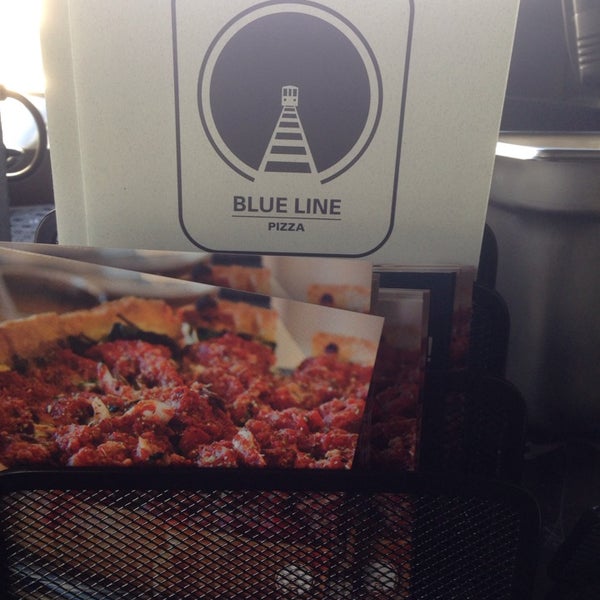 Photo taken at Blue Line Pizza by Kevin S. on 3/30/2014