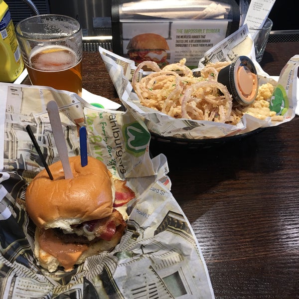Photo taken at Wahlburgers by Andy G. on 3/17/2018