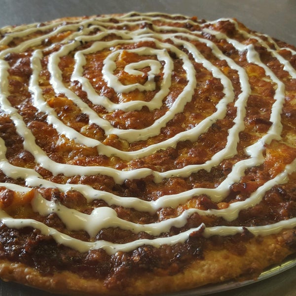 Sept POM: Robinator Pizza - BBQ Base, Chicken, Bacon, Ham, Philly Steak, Pizza Cheese, Cheddar Cheese with a ranch Swirl.