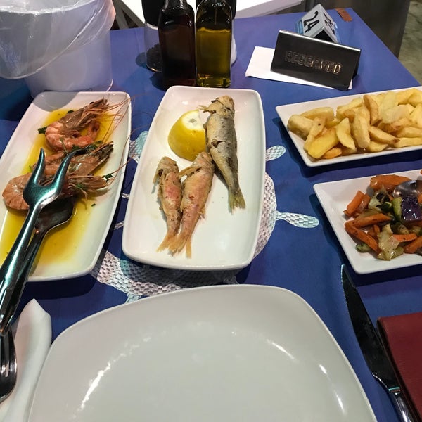 Photo taken at Vassos (Psarolimano) Fish Tavern by Maria D. on 5/10/2018
