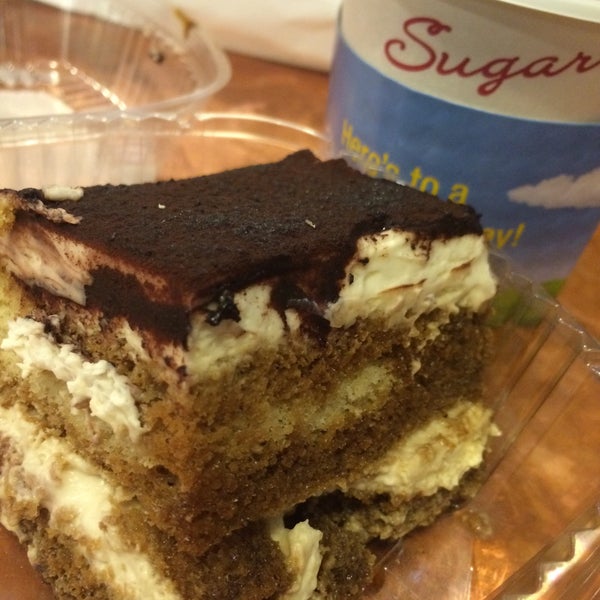 Photo taken at Sugar Cafe by Symba G. on 3/30/2015
