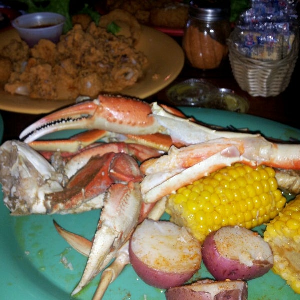Photo taken at Bluewater Seafood - 2920 Spring by Stephanie A. on 2/24/2013