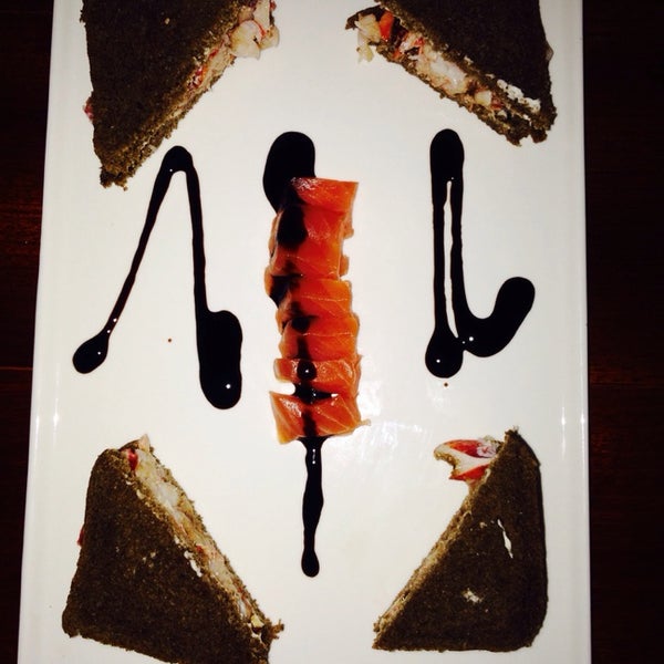 Photo taken at Caviarteria - Beluga Bar - Champagne &amp; Caviar Bar, Restaurant &amp; Lounge by Tatiana U. on 3/19/2014