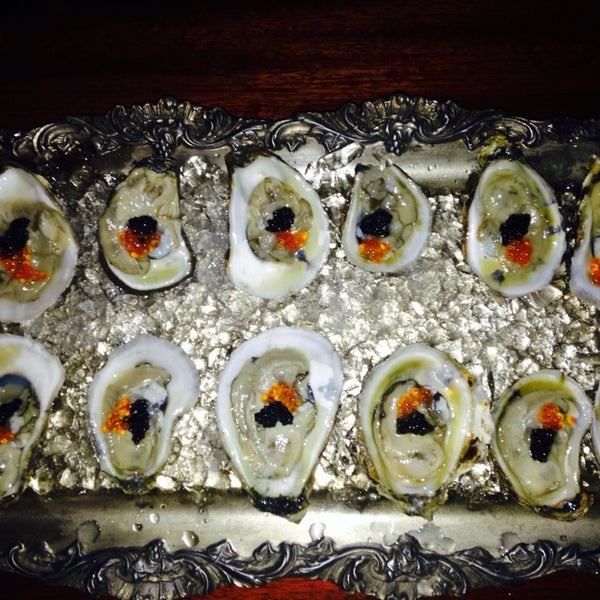 Photo taken at Caviarteria - Beluga Bar - Champagne &amp; Caviar Bar, Restaurant &amp; Lounge by Tatiana U. on 5/24/2014