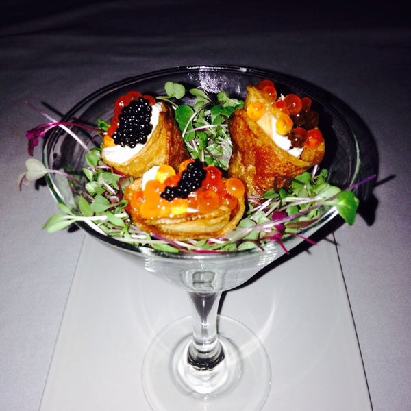 Photo taken at Caviarteria - Beluga Bar - Champagne &amp; Caviar Bar, Restaurant &amp; Lounge by Tatiana U. on 3/21/2014