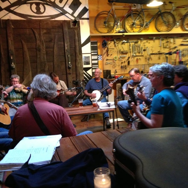 Photo taken at Velo Cult Bicycle Shop &amp; Bar by Melissa G. on 6/26/2013
