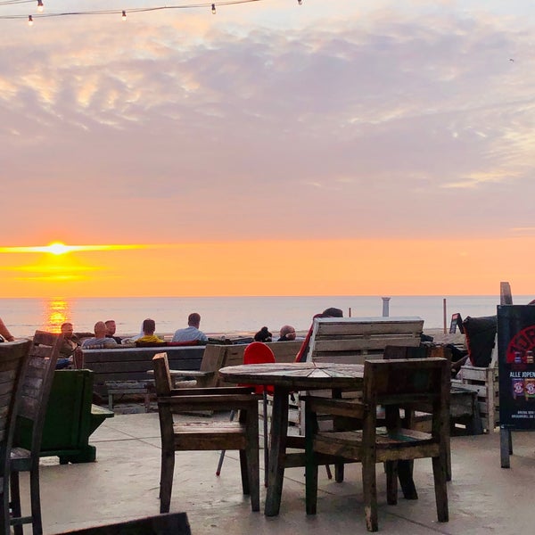 Photo taken at Mango&#39;s Beach Bar by Gustavo S. on 7/10/2021