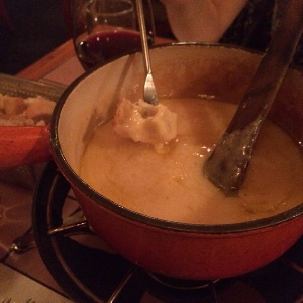Ordered cheese fondue. Said we would get bread, potatoes, onions, and pickles to dip. Only served bread. When bill came, we were charged for two cheese fondues ($62), because "two people ate". Rip off