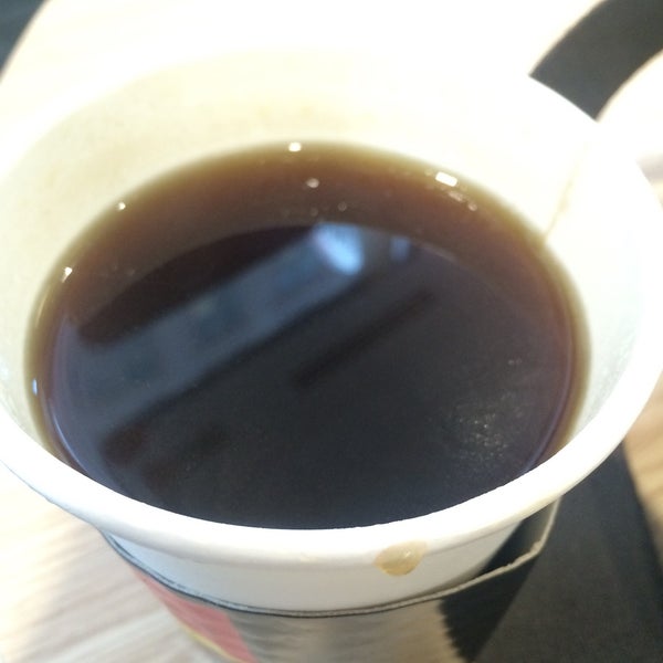 Americano tasted like hot water and had a minimum fee for cards.