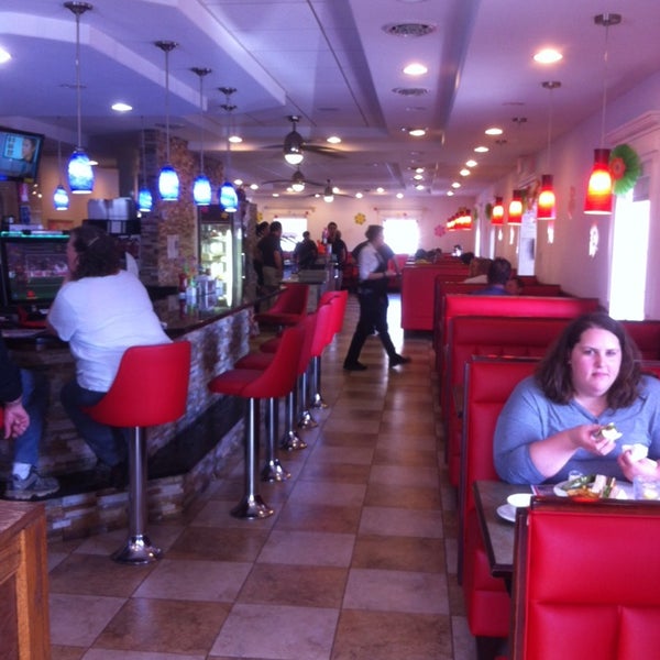 Photo taken at Rudy&#39;s Family Restaurant by Brianna M. on 4/19/2014