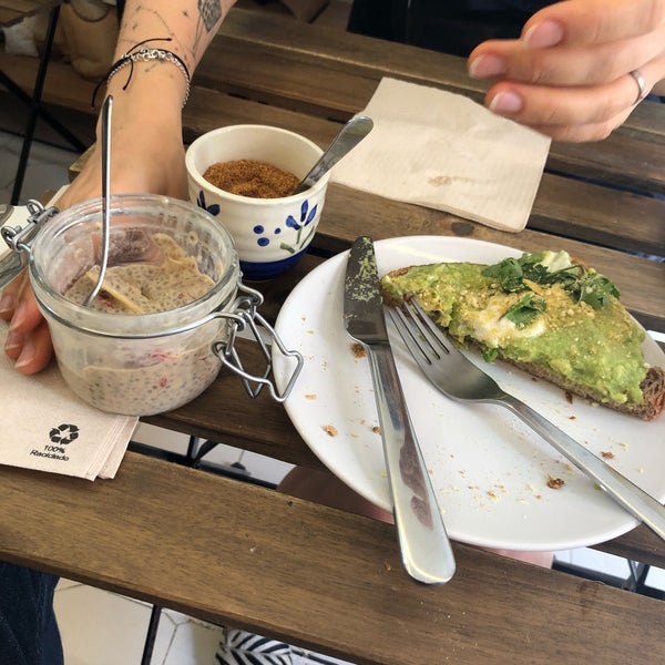 The avocado and cashew cream toast. chia pudding. Coffee. Georgie the dog. Very small but lovely first vegan brekkie in Madrid.