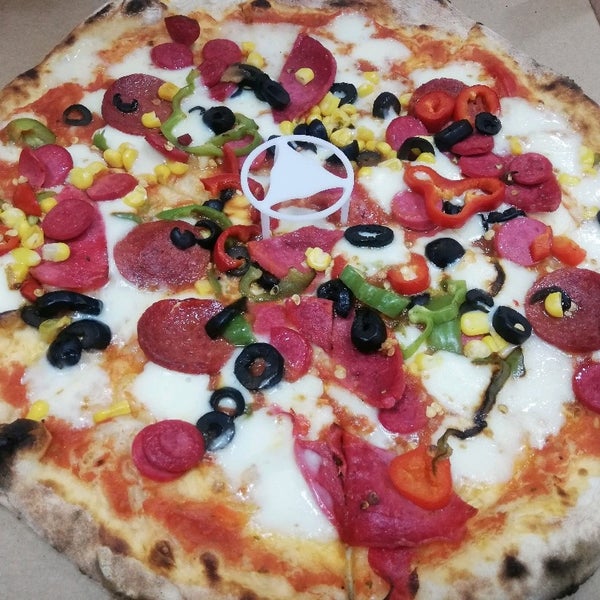 Foto tirada no(a) Double Zero Pizzeria por Işıl A. em 3/20/2020