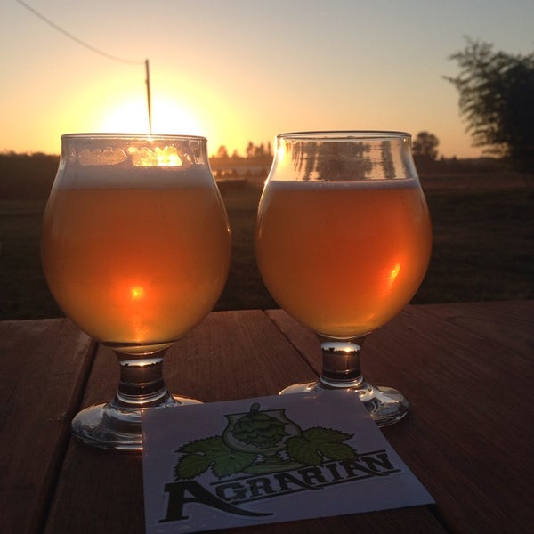Photo taken at Agrarian Ales by Becca H. on 9/14/2014