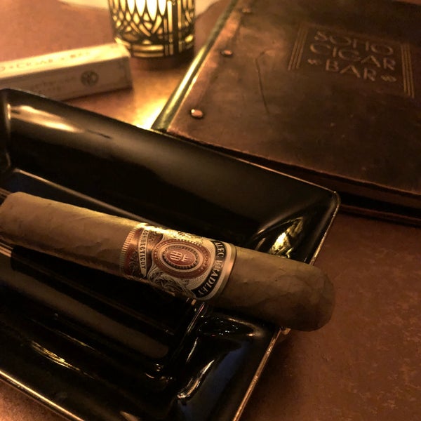 Photo taken at SoHo Cigar Bar by Zobia A. on 2/23/2019