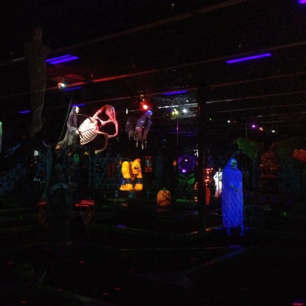 Photo taken at Monster Mini Golf by Anna F. on 4/26/2014