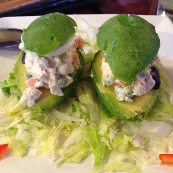 Photo taken at Emelina&#39;s Peruvian Restaurant by Mihir M. on 7/19/2014