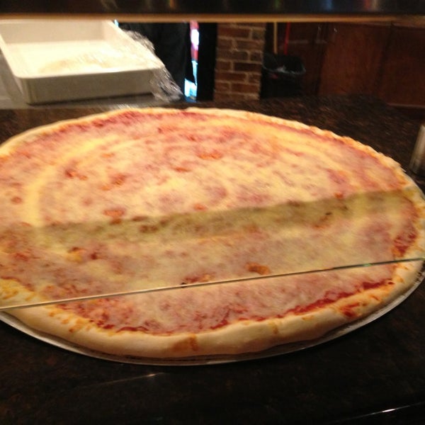 Photo taken at Russo&#39;s New York Pizzeria by ali l. on 1/1/2013