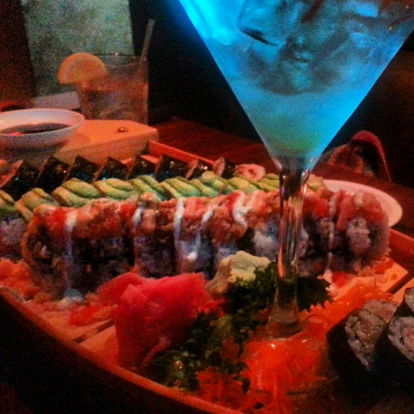 Photo taken at Galanga Thai Kitchen &amp; Sushi Bar by Diana C. on 3/26/2014