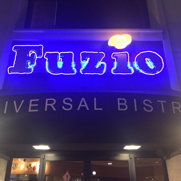 Photo taken at Fuzio Universal Bistro by Gingi V. on 9/12/2015