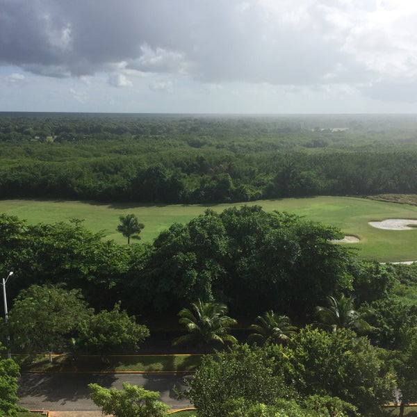 Photo taken at Melia Cozumel All Inclusive Golf &amp; Beach Resort by Ian R. on 12/3/2015
