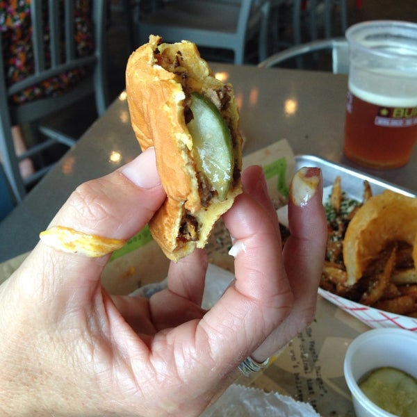 Photo taken at BurgerFi by Beth H. on 4/26/2014