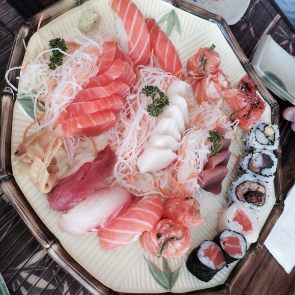 Photo taken at Sushi Mart by Marcela C. on 5/31/2014