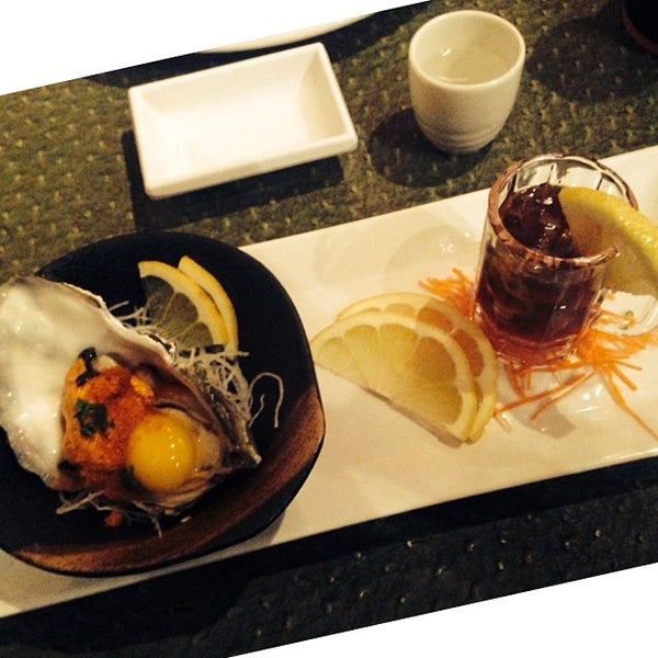 Photo taken at Oops! Sushi &amp; Sake Bar by Justin T. on 2/1/2014
