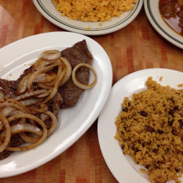 Photo taken at International Restaurant by Irene Vasquez R. on 6/15/2014