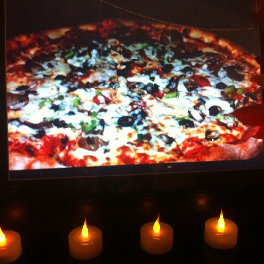 Photo taken at Broadway Ristorante &amp; Pizzeria by Christa C. on 12/17/2012