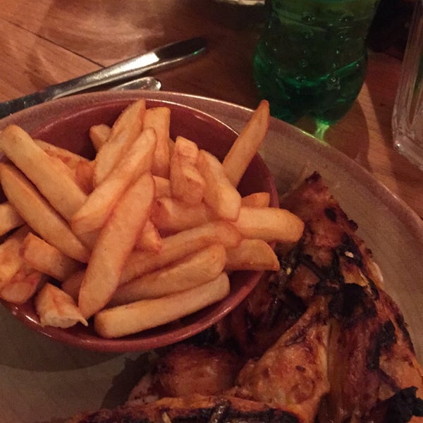 Photo taken at Nando&#39;s by Quentin E. on 1/8/2015