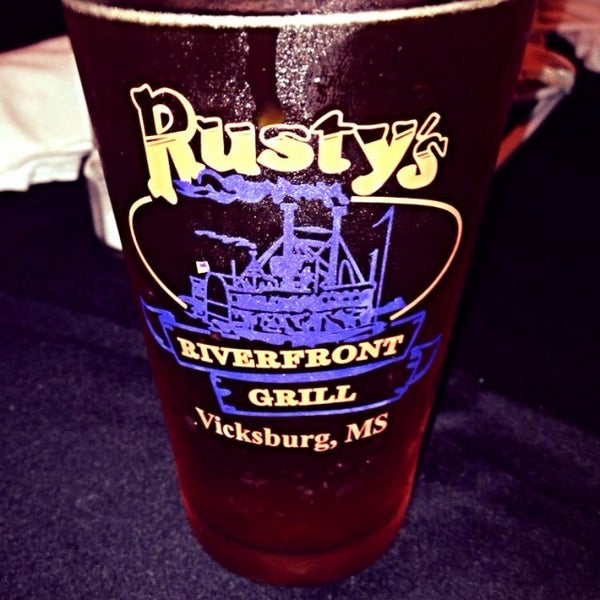 Photo taken at Rusty&#39;s Riverfront Grill by Russell M. on 7/12/2014