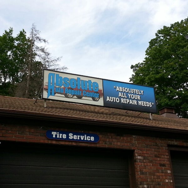 Photo taken at Absolute Auto Repair Center - Fitchburg by Mat G. on 5/28/2013