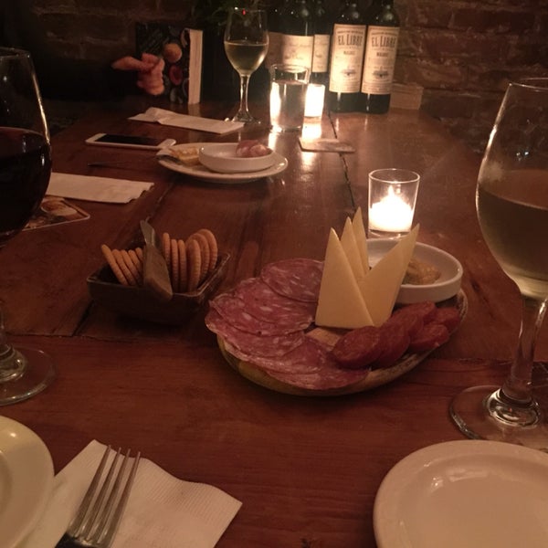 Try the Sancerre with the meat and cheese plate. Reasonably priced and delicious quality