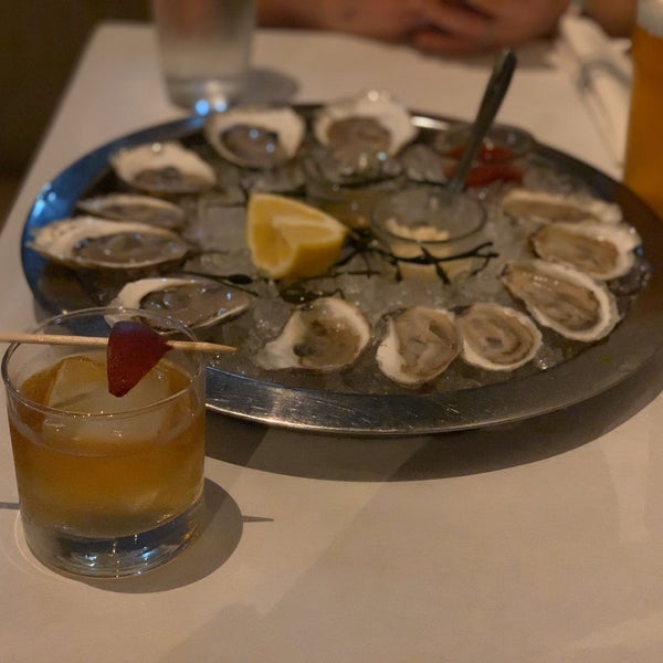 Photo taken at Henlopen City Oyster House by Mike R. on 7/19/2019
