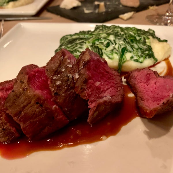 Photo taken at Benchmark Restaurant by Nate H. on 12/2/2018