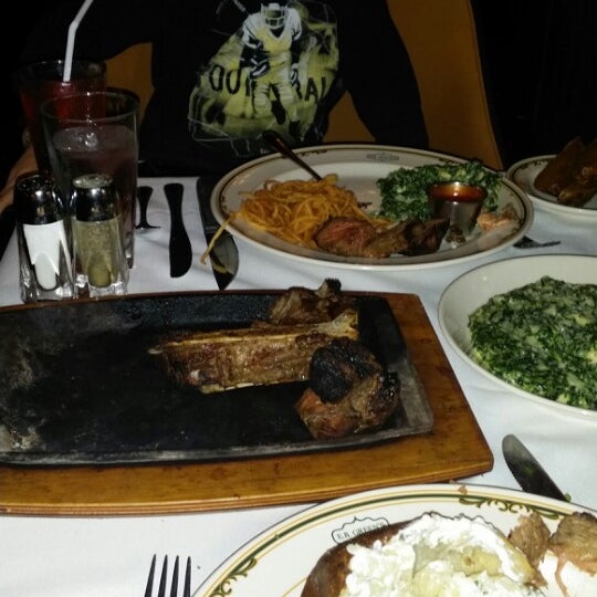 Photo taken at EB Green&#39;s Steakhouse by Mark K. on 12/21/2013