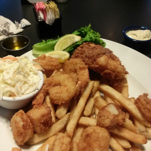 Photo taken at Fish Tale Grill by Merrick Seafood by Darlene&#39;s H. on 5/5/2014
