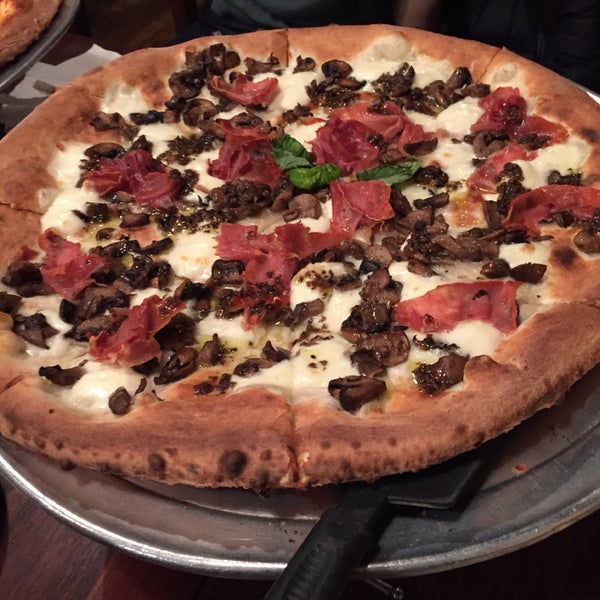 order the michele: love that they don't skimp on the mushrooms and you really can't go wrong with truffle. pairs nicely with the diavola (spicy salami). the fried calamari is nothing special.