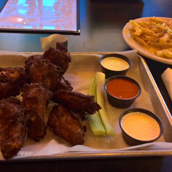 Great sports bar with a ton of TV's and really good burnt orange wings!!