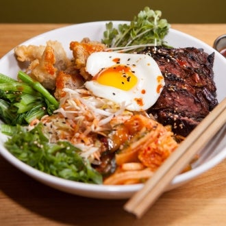 The grilled hanger steak bi bim bop at the Bento Box is one of the 100 best things we ate this year. http://tmout.us/rLOtk