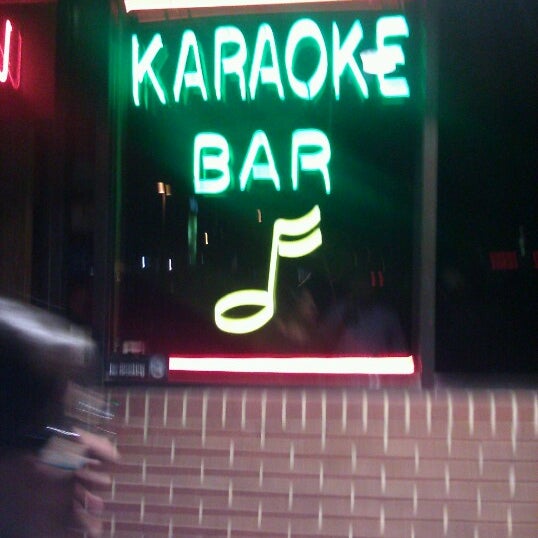 Снимок сделан в The Common Interest Karaoke Bar &amp; Grill пользователем Aaron K. 12/16/2012