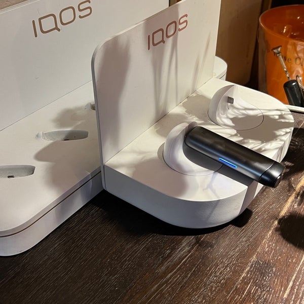 They have an IQOS recharging station!