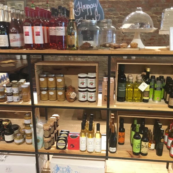 Photo taken at Cork Wine Bar and Market by Cesar C. on 5/19/2019