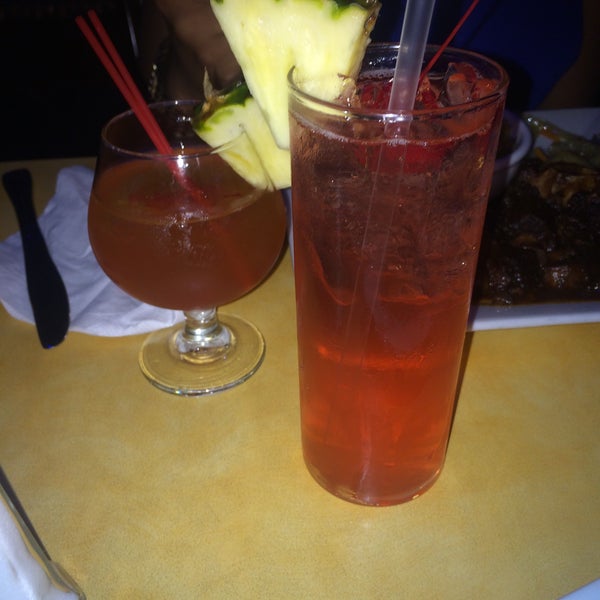 Photo taken at Reef Caribbean Restaurant And Lounge by Keeks B. on 4/26/2015